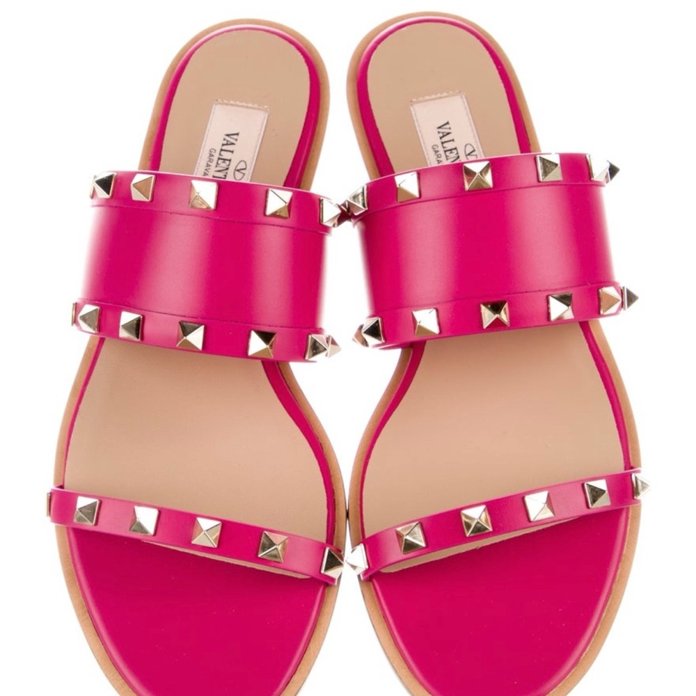 Valentino Leather Slides
• Pink
• Rockstud Accents